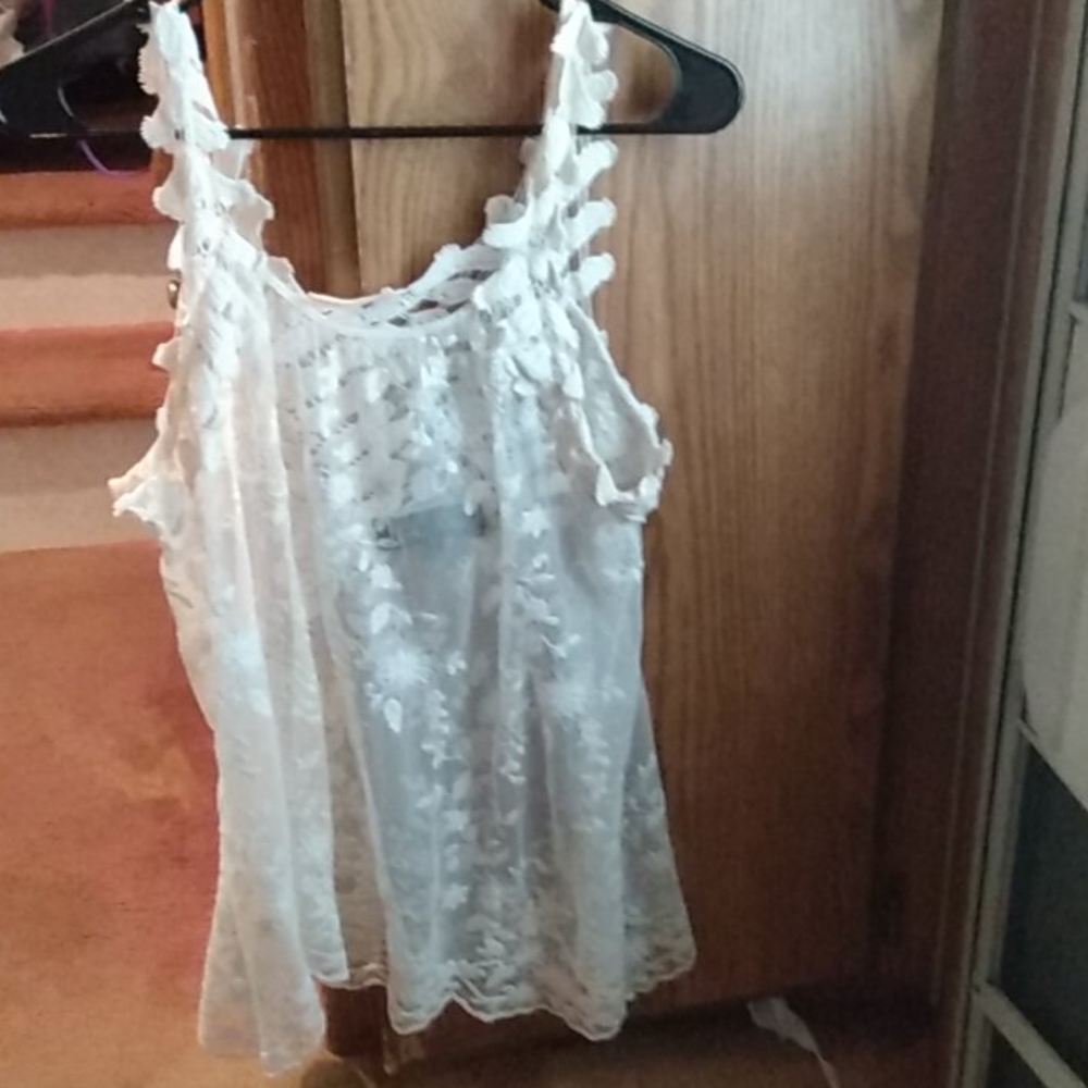 See-through very cute dressy tank top.